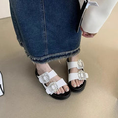 ビジューバックルフラットサンダル